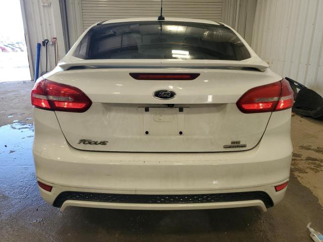 Photo 6 from auction – 2015 FORD FOCUS SE with VIN 1FADP3F29FL220161