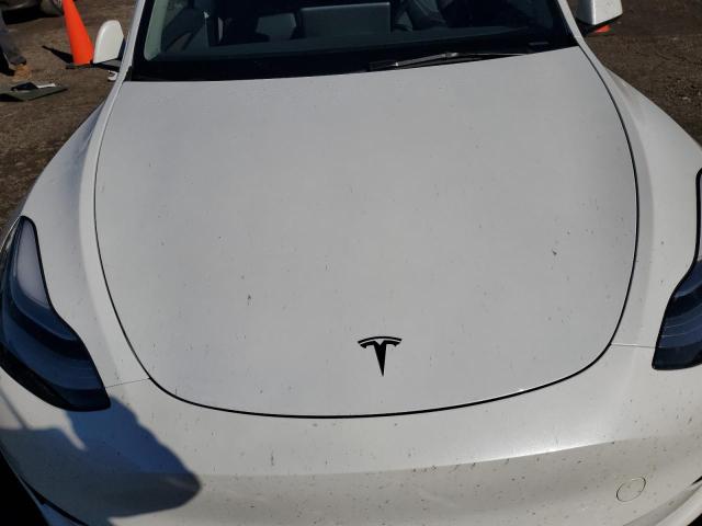 Photo 11 from auction – 2022 TESLA MODEL Y with VIN 7SAYGDEE7NA015212