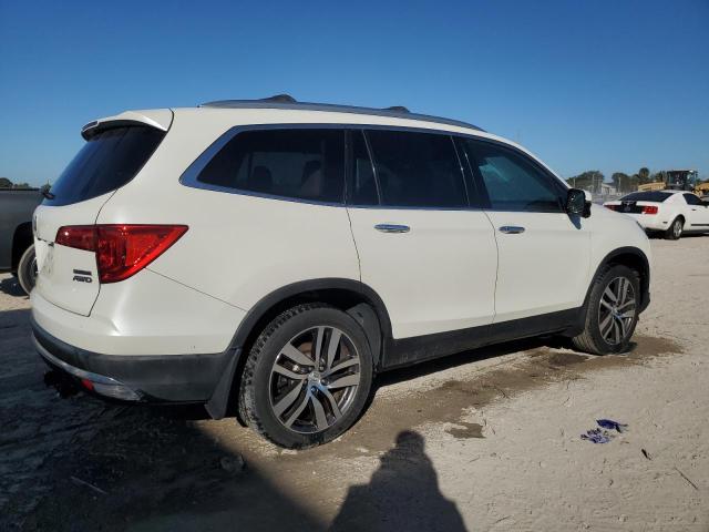 Photo 3 from auction – 2016 HONDA PILOT TOUR with VIN 5FNYF6H96GB040196