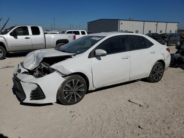 TOYOTA COROLLA L 2018 with VIN 5YFBURHE2JP763677 - Photo from auction