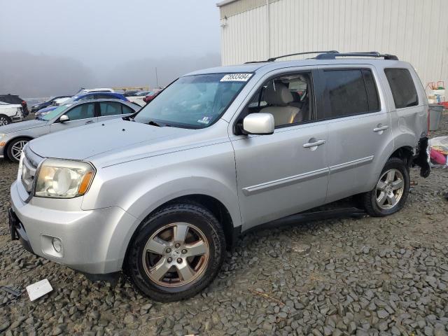 HONDA PILOT EXL 2011 with VIN 5FNYF4H51BB029035 - Photo from auction