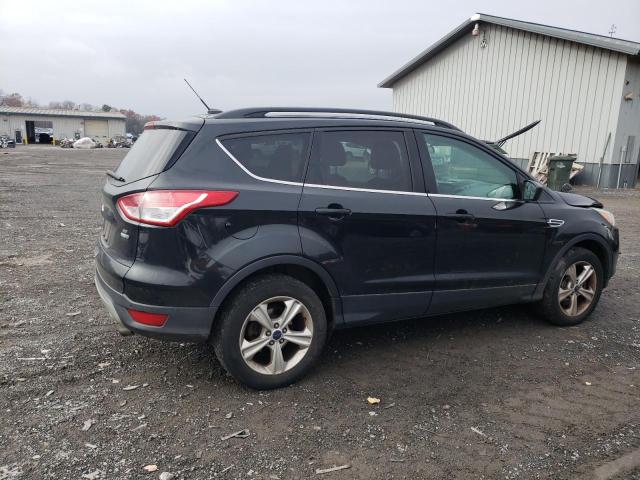 Photo 3 from auction – 2015 FORD ESCAPE SE with VIN 1FMCU9G99FUA98226