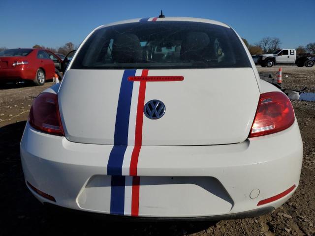 Photo 6 from auction – 2013 VOLKSWAGEN BEETLE with VIN 3VWFP7AT4DM640820