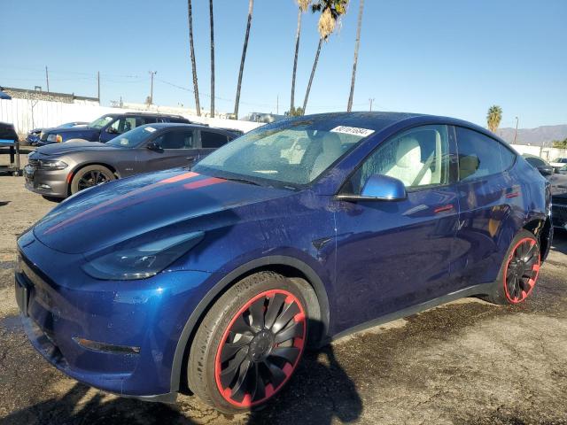 TESLA MODEL Y 2022 with VIN 7SAYGDEF5NF551510 - Photo from auction