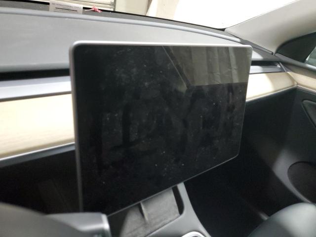 Photo 9 from auction – 2023 TESLA MODEL Y with VIN 7SAYGDEE7PA042302