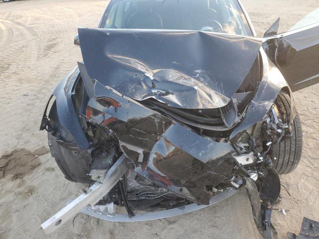 Photo 11 from auction – 2019 TESLA MODEL 3 with VIN 5YJ3E1EB3KF385587