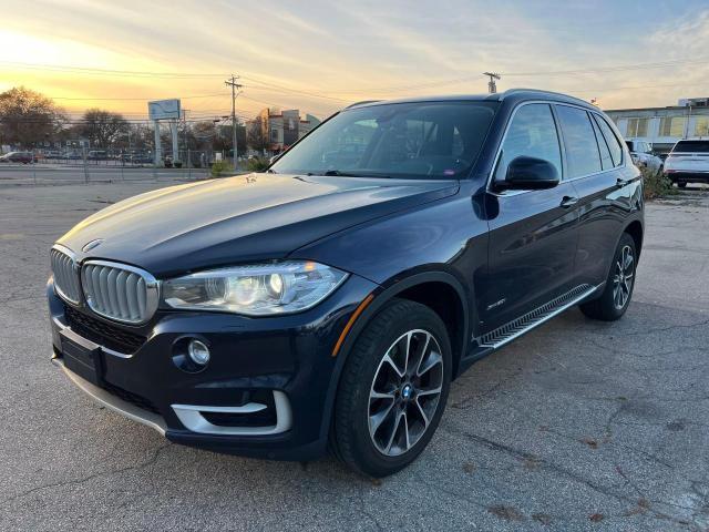 Photo 2 from auction – 2015 BMW X5 XDRIVE5 with VIN 5UXKR6C55F0J77997