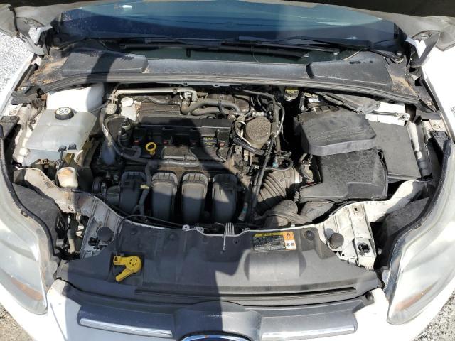 Photo 11 from auction – 2013 FORD FOCUS SE with VIN 1FADP3F24DL278949