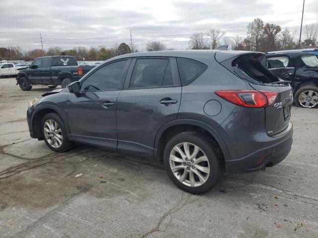 Photo 2 from auction – 2014 MAZDA CX-5 GT with VIN JM3KE4DYXE0318949