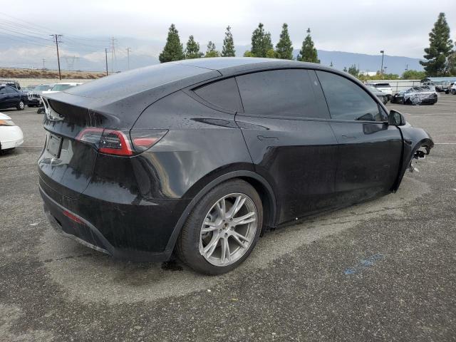 Photo 3 from auction – 2023 TESLA MODEL Y with VIN 7SAYGDED9PF978075