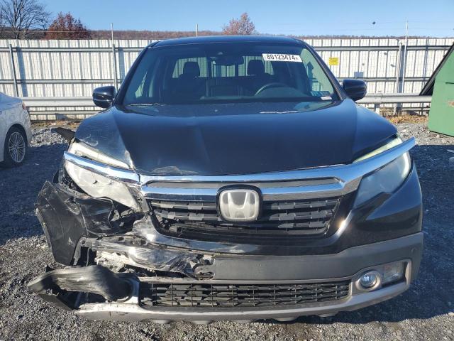 Photo 5 from auction – 2018 HONDA RIDGELINE with VIN 5FPYK3F7XJB014162