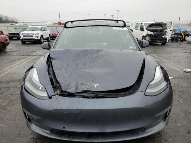 Photo 5 from auction – 2022 TESLA MODEL 3 with VIN 5YJ3E1EB7NF107442