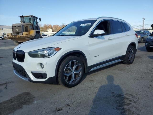 BMW X1 XDRIVE2 2018 with VIN WBXHT3C38J5F89097 - Photo from auction