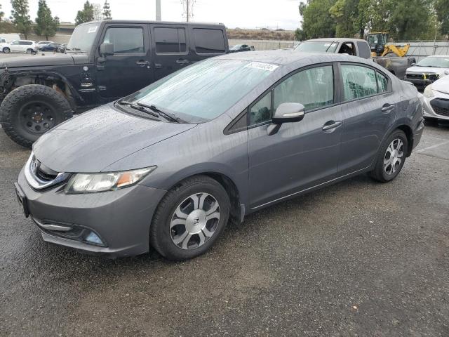 Photo 1 from auction – 2013 HONDA CIVIC HYBR with VIN 19XFB4F34DE202267