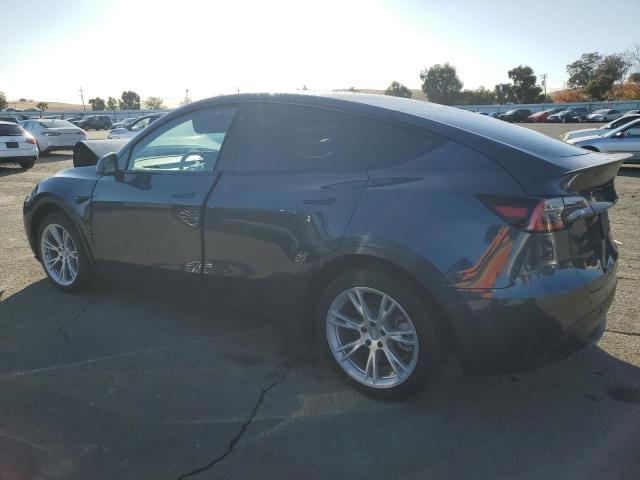 Photo 2 from auction – 2021 TESLA MODEL Y with VIN 5YJYGDEEXMF094213