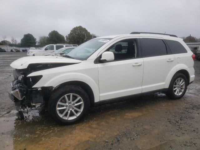 DODGE JOURNEY SX 2014 with VIN 3C4PDCBG8ET142878 - Photo from auction