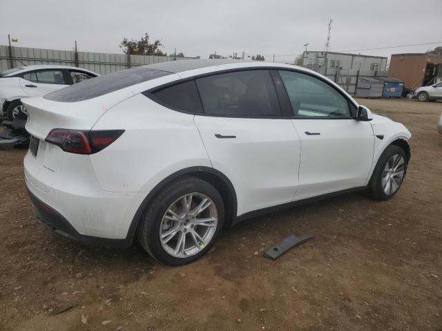 Photo 3 from auction – 2023 TESLA MODEL Y with VIN 7SAYGDEE6PF873289