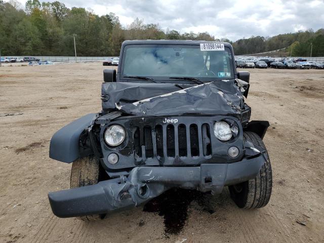 Photo 5 from auction – 2015 JEEP WRANGLER U with VIN 1C4BJWDG6FL754592