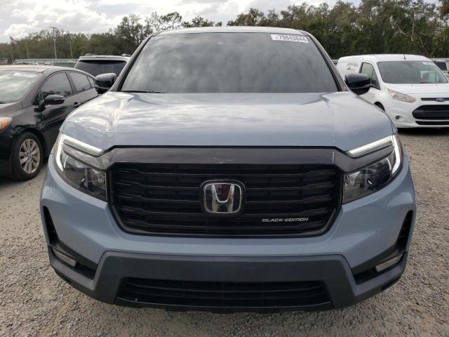 Photo 5 from auction – 2022 HONDA RIDGELINE with VIN 5FPYK3F85NB033667