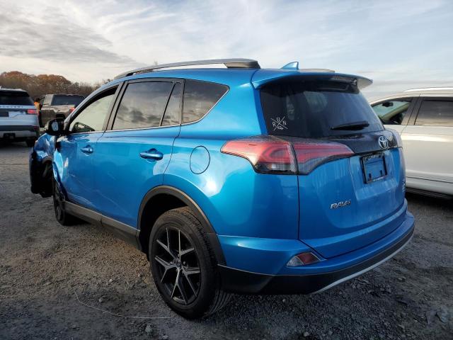 Photo 2 from auction – 2018 TOYOTA RAV4 SE with VIN JTMJFREV9JD226463