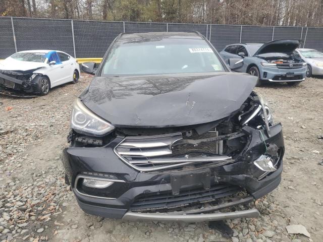 Photo 5 from auction – 2018 HYUNDAI SANTA FE S with VIN 5NMZU3LB1JH064169