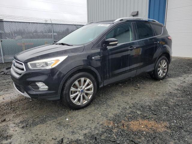 FORD ESCAPE TIT 2017 with VIN 1FMCU9J93HUD60835 - Photo from auction