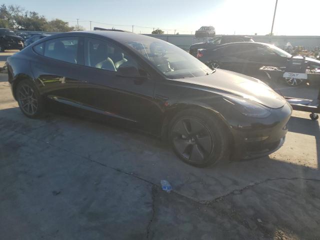 Photo 4 from auction – 2021 TESLA MODEL 3 with VIN 5YJ3E1EB3MF903135