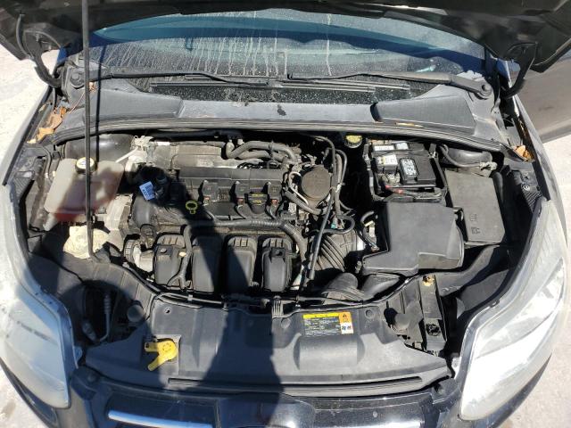 Photo 11 from auction – 2013 FORD FOCUS TITA with VIN 1FADP3N29DL104635