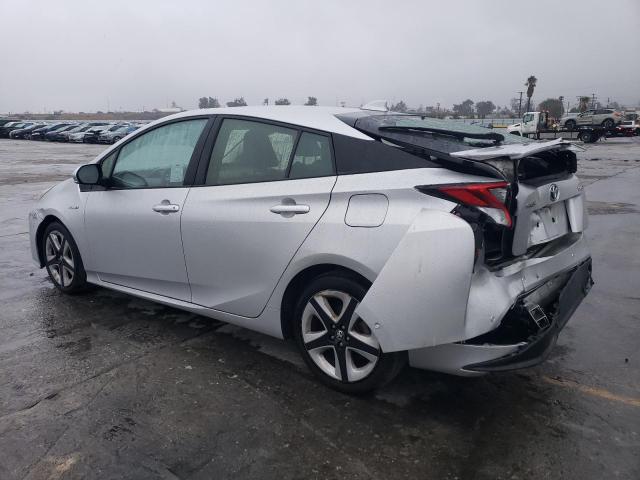 Photo 2 from auction – 2016 TOYOTA PRIUS with VIN JTDKARFU7G3520564