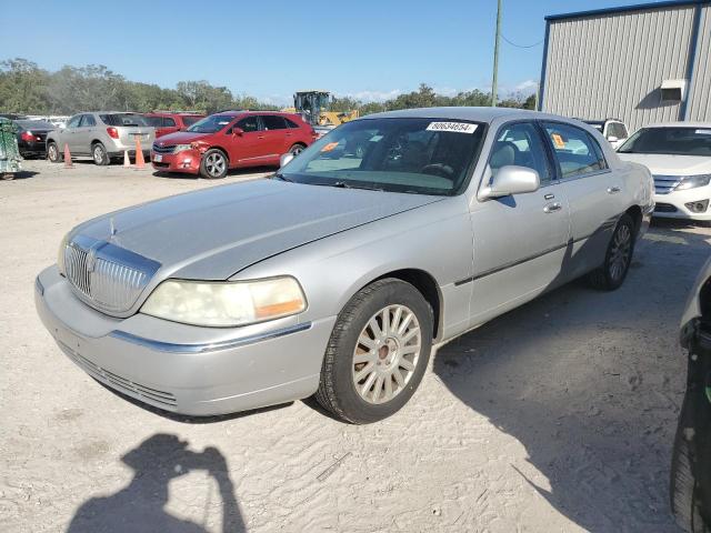 LINCOLN TOWN CAR E 2003 with VIN 1LNHM81W23Y671549 - Photo from auction