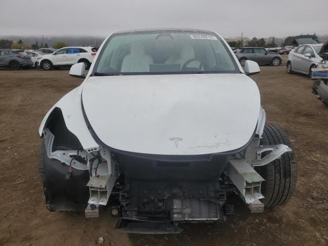 Photo 5 from auction – 2023 TESLA MODEL Y with VIN 7SAYGDEE6PF873289