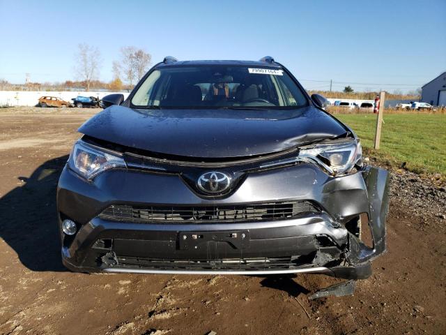 Photo 5 from auction – 2017 TOYOTA RAV4 XLE with VIN JTMRFREV2HD212207
