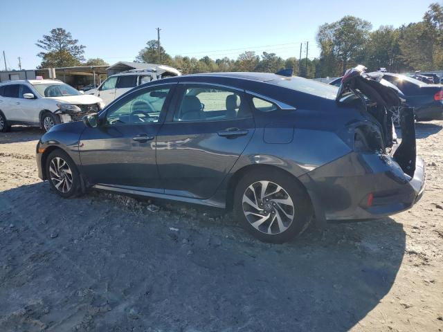 Photo 2 from auction – 2018 HONDA CIVIC EX with VIN 19XFC2F74JE001436