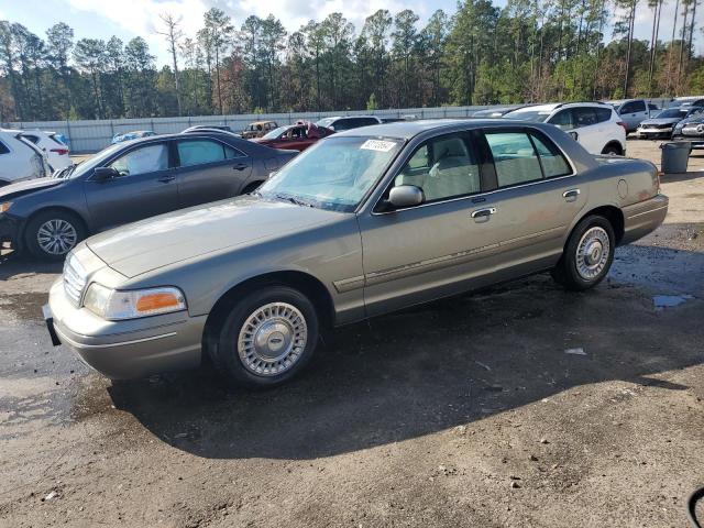 FORD CROWN VICT 2000 with VIN 2FAFP73W0YX173874 - Photo from auction