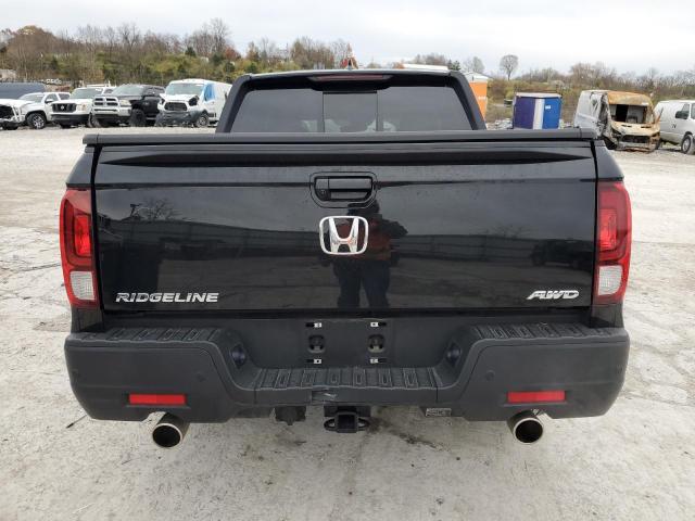 Photo 6 from auction – 2023 HONDA RIDGELINE with VIN 5FPYK3F81PB050419