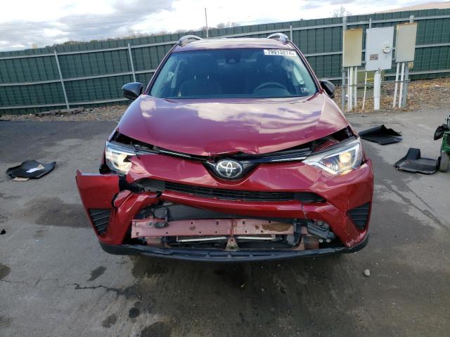 Photo 5 from auction – 2018 TOYOTA RAV4 LE with VIN 2T3BFREV9JW826987
