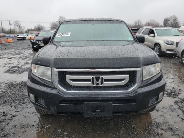 Photo 5 from auction – 2011 HONDA RIDGELINE with VIN 5FPYK1F49BB455082