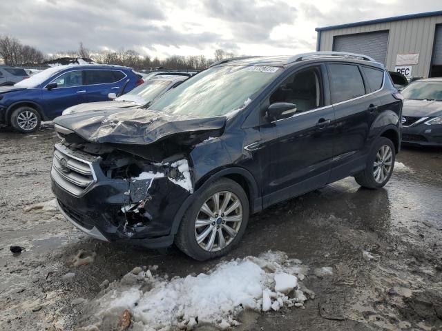 FORD ESCAPE TIT 2017 with VIN 1FMCU9JD7HUD23730 - Photo from auction