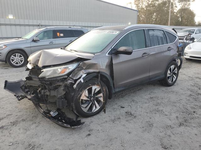 Photo 1 from auction – 2016 HONDA CR-V TOURI with VIN 5J6RM3H95GL028394