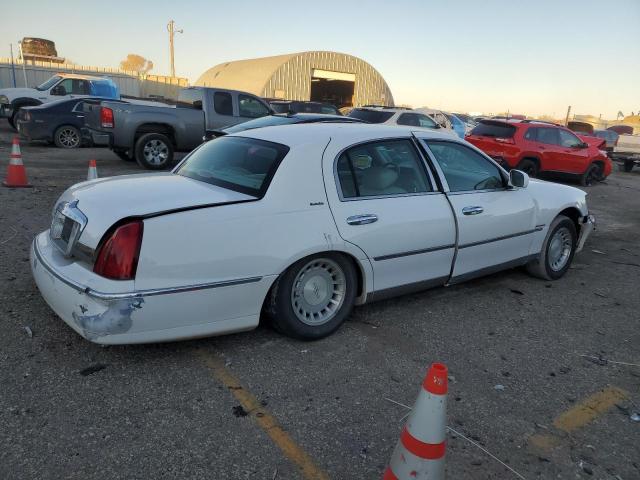 Photo 3 from auction – 2001 LINCOLN TOWN CAR E with VIN 1LNHM81W41Y669105