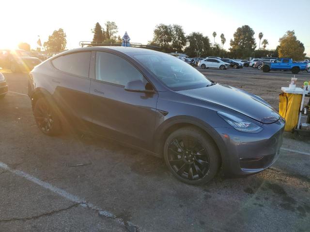 Photo 4 from auction – 2023 TESLA MODEL Y with VIN 7SAYGAEE6PF598358
