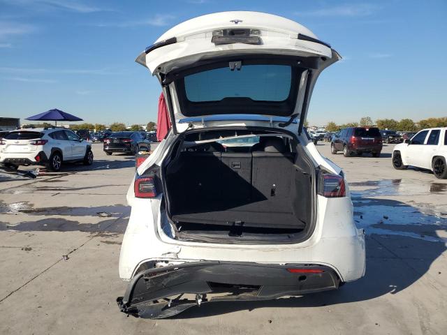 Photo 6 from auction – 2023 TESLA MODEL Y with VIN 7SAYGDEE6PF612468