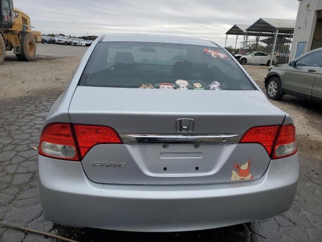 Photo 6 from auction – 2011 HONDA CIVIC LX with VIN 19XFA1F59BE035548
