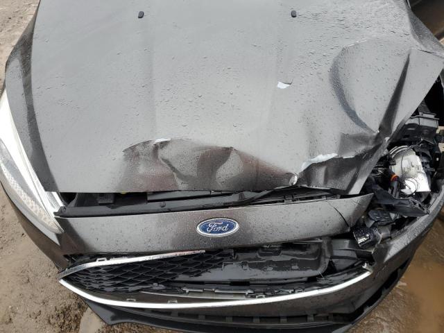 Photo 11 from auction – 2016 FORD FOCUS SE with VIN 1FADP3K20GL220704