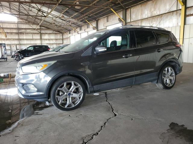 FORD ESCAPE TIT 2017 with VIN 1FMCU9J90HUF11162 - Photo from auction