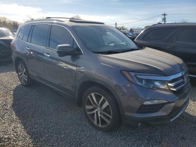 Photo 4 from auction – 2018 HONDA PILOT TOUR with VIN 5FNYF6H94JB004630