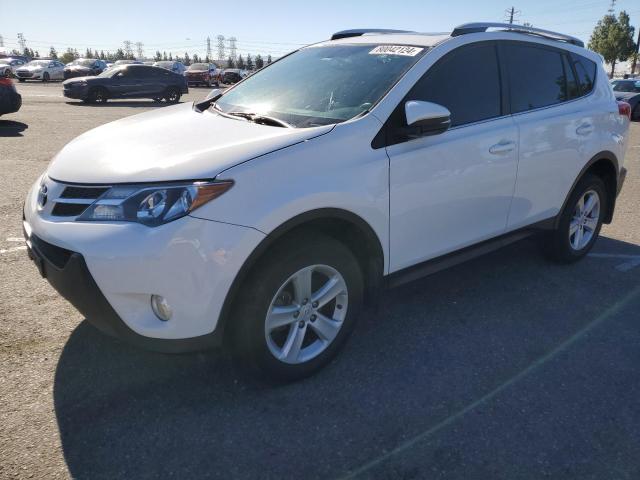 TOYOTA RAV4 XLE 2014 with VIN 2T3WFREV9EW096909 - Photo from auction