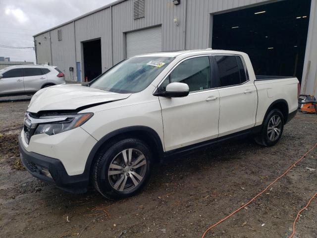 HONDA RIDGELINE 2017 with VIN 5FPYK2F45HB010594 - Photo from auction