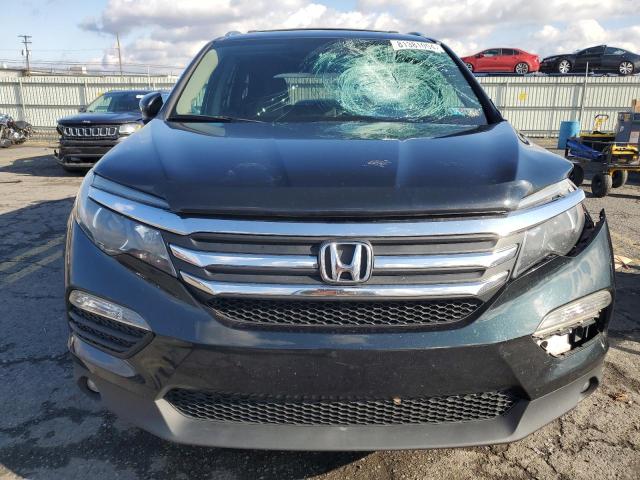 Photo 5 from auction – 2016 HONDA PILOT EXL with VIN 5FNYF6H89GB027840
