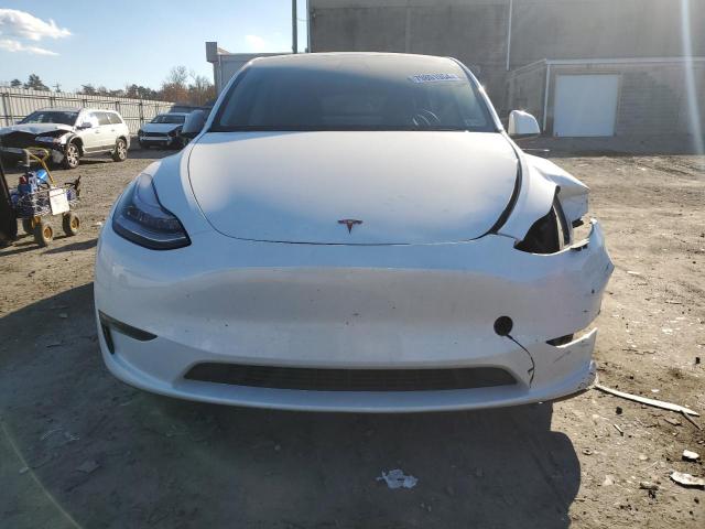 Photo 5 from auction – 2023 TESLA MODEL Y with VIN 7SAYGDEE0PF610828
